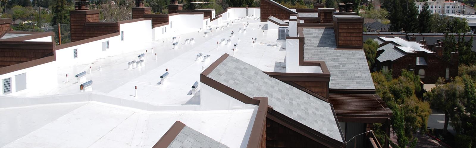 Flat, white residential buildings