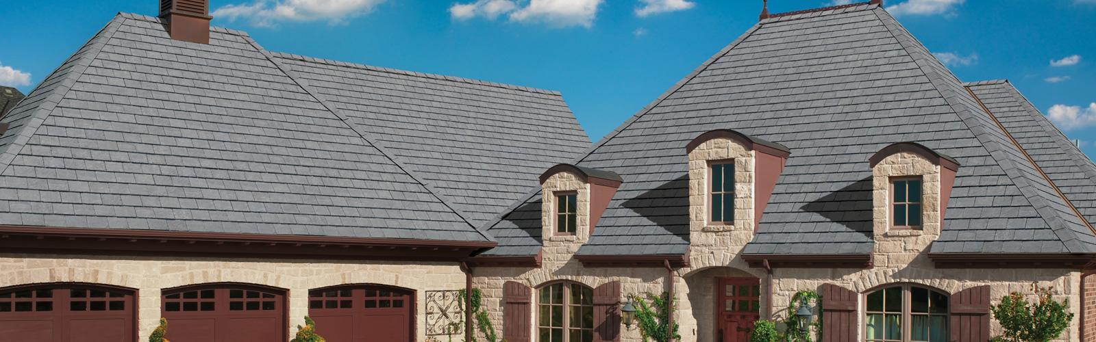 Higher-end home with a gray shingle roof